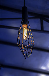 Low angle view of illuminated light bulb