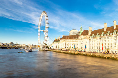 View of ferris wheel in city