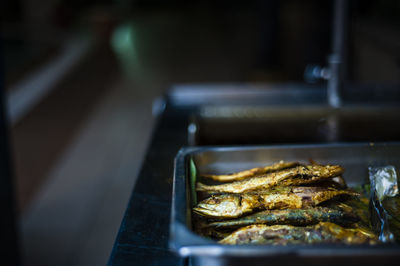 Close-up of seafood in container on table