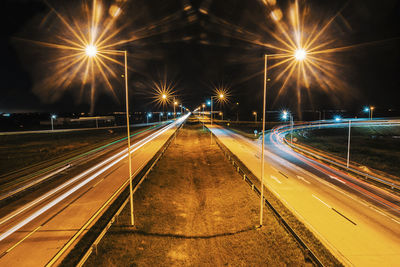 Light trails on road at night