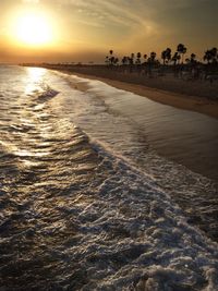 Scenic view of sea at sunset