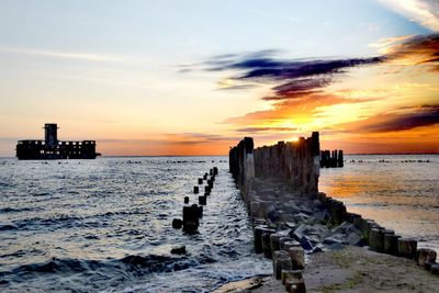 Scenic view of sea against sky during sunset