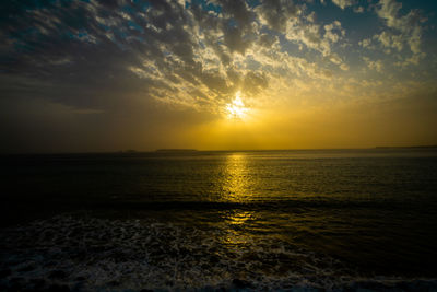 Scenic view of sea against sky during sunset