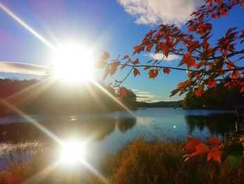 Sun shining over lake