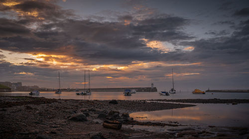 Scenic view of sea against sky during sunset