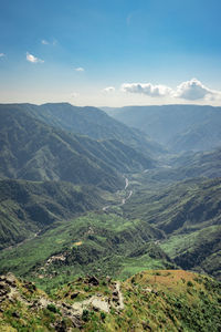 Scenic view of valley against sky