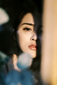 Close-up portrait of young woman