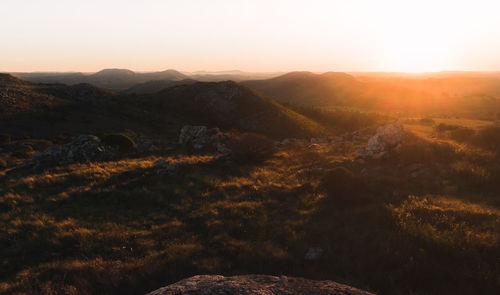 Scenic view of mountains against sky during sunset