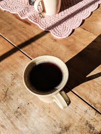 High angle view of coffee cup on table