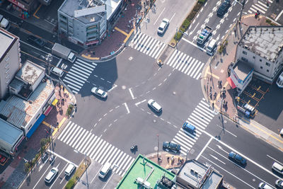 High angle view of vehicles on road in city