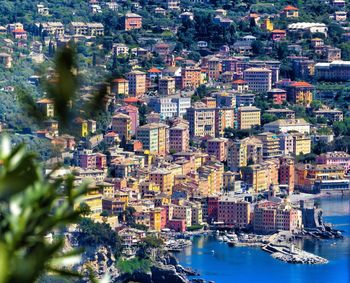 High angle view of cityscape by sea