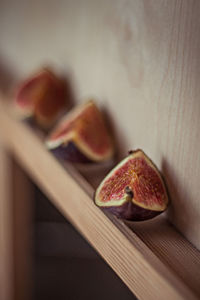 Close-up of fig slices on shelf