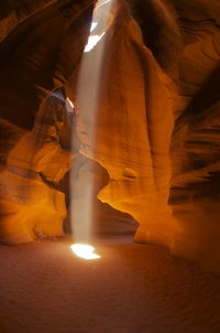 Blurred motion of person on rock