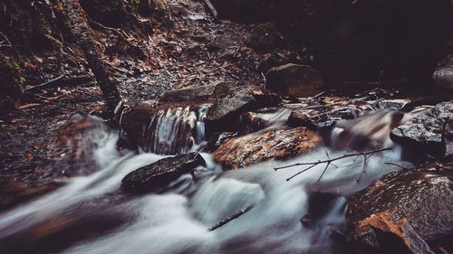 View of water flowing through rocks