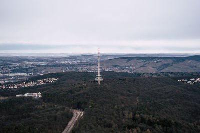 High angle view of communications tower in city