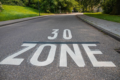 Road sign on street in city