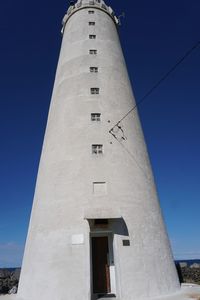 Low angle view of building against blue sky