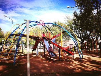 View of swing in park against sky