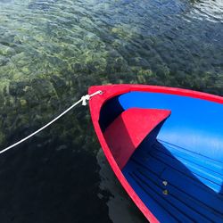 High angle view of red boat moored on river