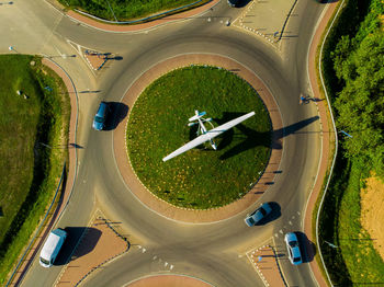 High angle view of cars moving on street in city