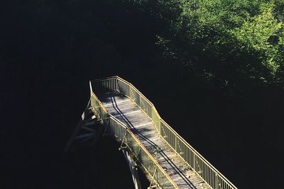 Footbridge against clear sky