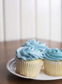 Close-up of cupcakes on table