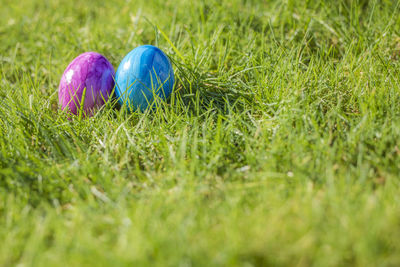 Close-up of easter egg on grassy field