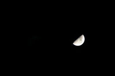 Scenic view of moon against sky at night