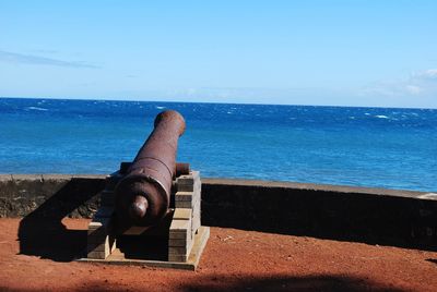 Scenic view of sea against blue sky