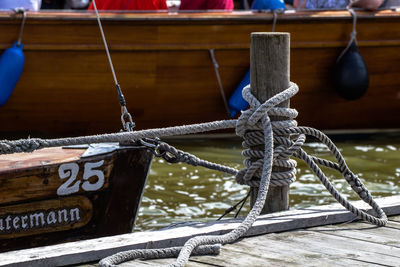 Boat moored at harbor