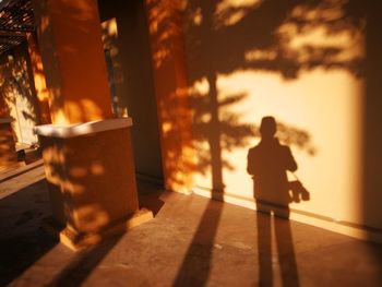Silhouette of person shadow on floor