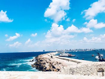 Scenic view of beach against sky