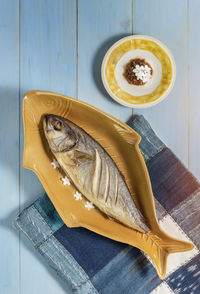 High angle view of fish on table