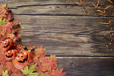 High angle view of autumn leaves on table