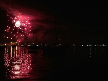 Reflection of illuminated buildings in water