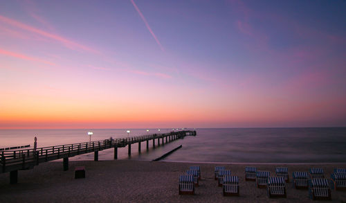 Scenic view of sea against sky at sunset