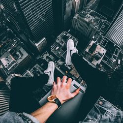 High angle view of people and buildings in city