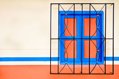 Multi colored flag on wall