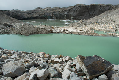 Scenic view of lake by mountains