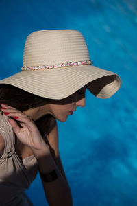 High angle view of woman by swimming pool