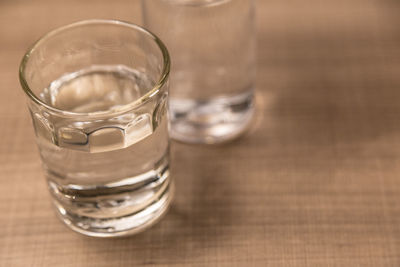 Close-up of beer glass on table