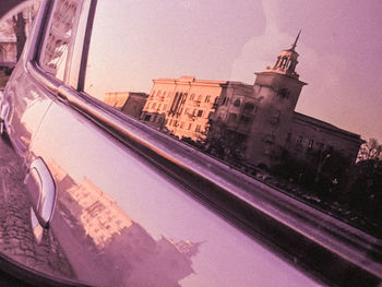 Reflection of building on glass window