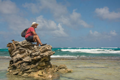 Man over a rock formation