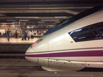 Man standing at railroad station