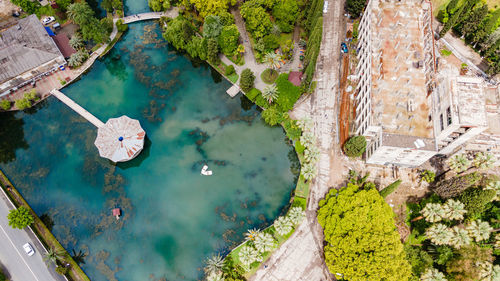 High angle view of swimming pool by building