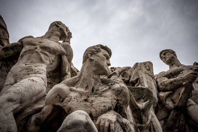 Low angle view of statue against sky