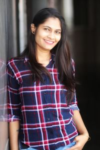 Portrait of smiling young woman