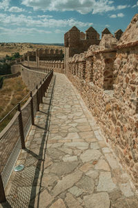 Footpath leading towards stone wall