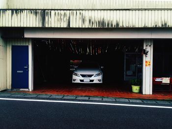 View of road along buildings