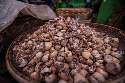 Close-up of areca nuts for sale at market